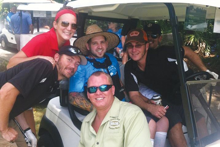 Kurt Becker with some of the staff of the Siesta Key Oyster Bar at the golf tournament Saturday, Sept. 8. Photo courtesy of Ryan Schmidt.