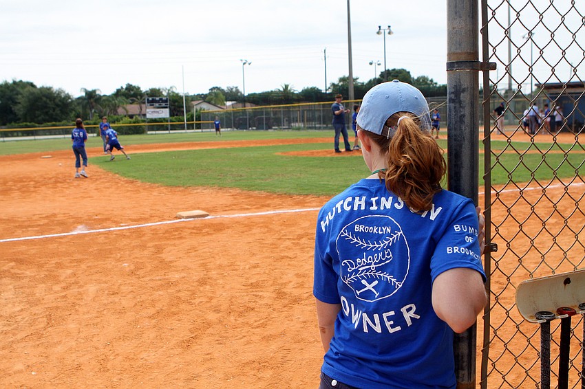 Leah Hutchinson watches her kids warm up out on the field prior to playing the next inning Friday, April 29 during the Ashton Elementary fifth grade World Series day at Twin Lakes.
