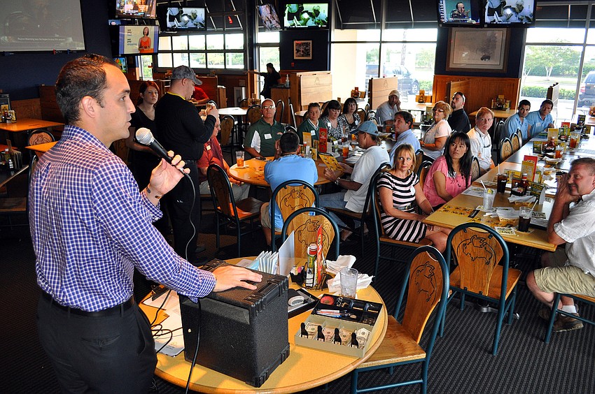 Kevin Cooper talks to the people who attended the Siesta Key Chamber luncheon Friday, Oct. 7 at Buffalo Wild Wings.