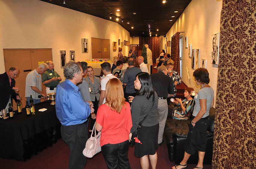 Members of the Rosemary District came out for appetizers and chit-chat prior attending a performance of â€œThe Full Montyâ€, Wednesday, May 2, at The Players.