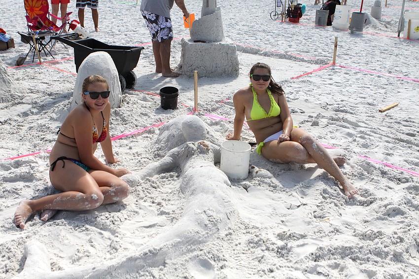 Daria Muklewicz, 12, and Gabija LaBanauskaite, 14, made a mermaid out of sand.