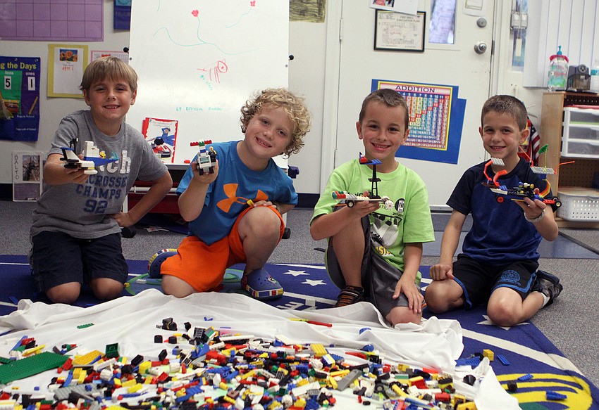 Connor Lea, 7, Will Becker, 7, Johnny Robinson, 7, and Jackson Fox, 7, had fun making all sorts of things out of Legos.