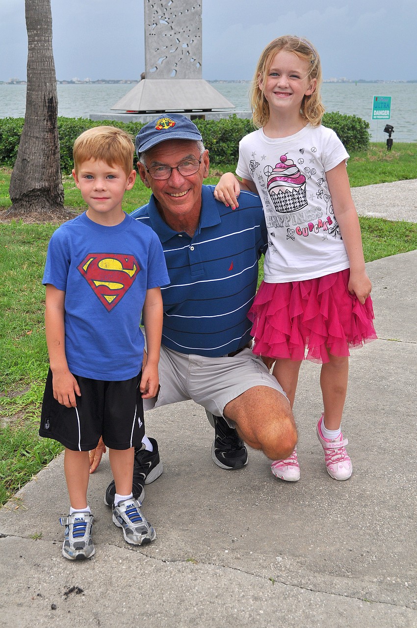 Parker Nippert, 4, Fred Beals, and Reese Nippert, 6