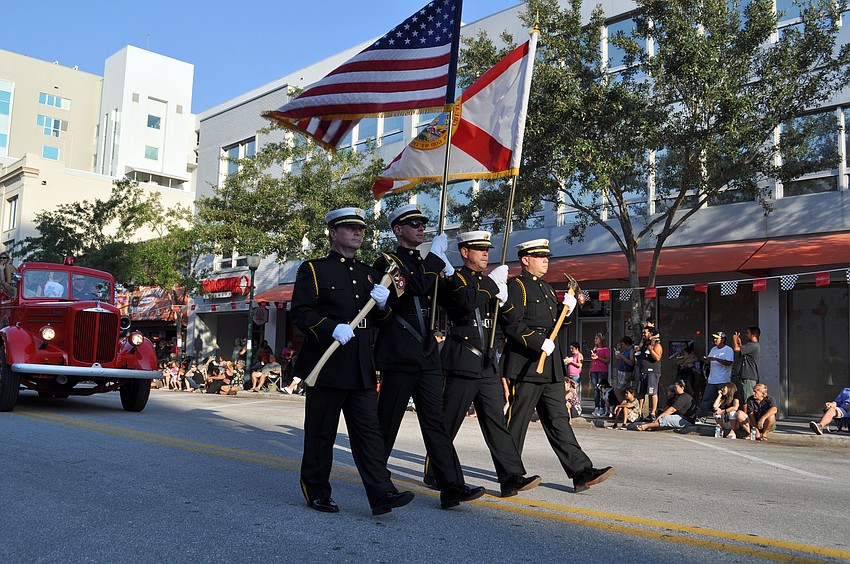 The Sarasota Fire Fighters Benevolent Fund marches in the parade.