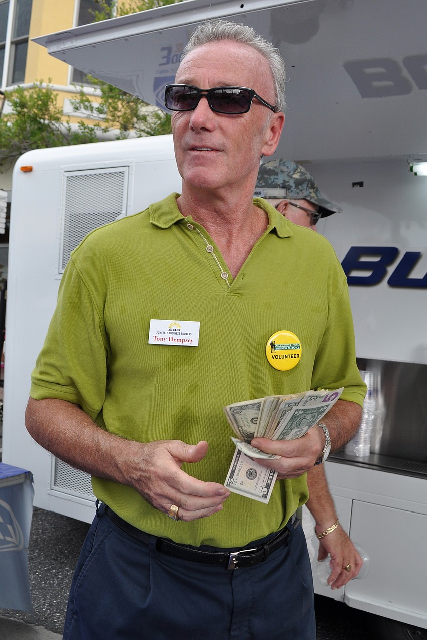 Tony Dempsey helped serve beer for the Lakewood Ranch Business Alliance.