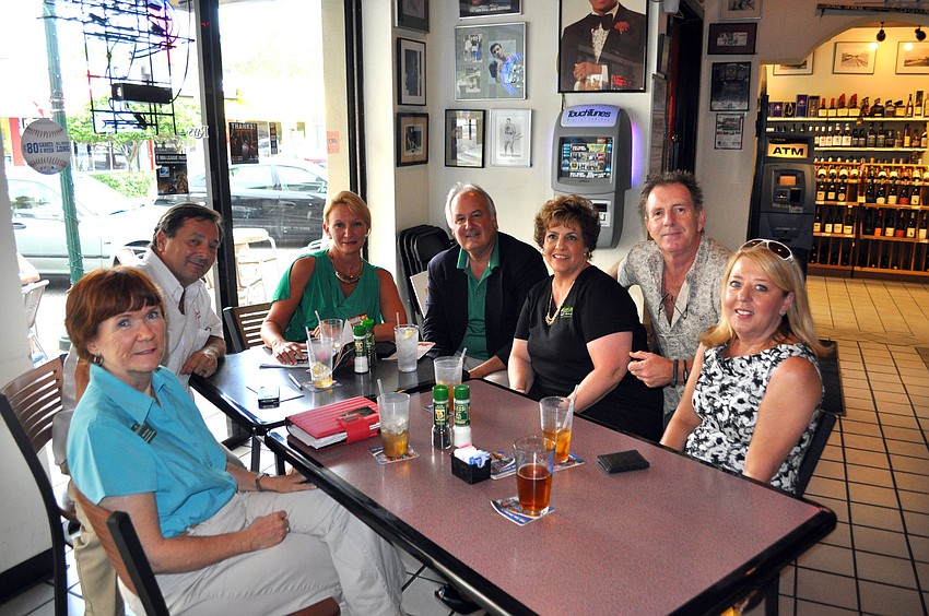 Nancy Taussig of Barefoot Weddings, Jack Elka of Elka Photography, Dawn Mims, executive vice president of the chamber, Tom Aposporos, president of the chamber, Kathy Shumway and Gordon and Lynda Hall of Green Ginger.