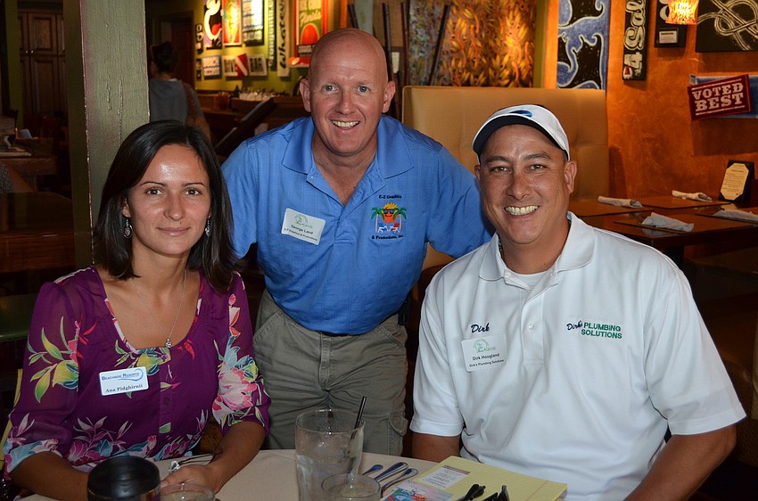 Ana Pidghirnii of Beachside Resorts, George Land of E-Z Graphics and Promotions and Dirk Hoogland of Dirkâ€™s Plumbing Solutions