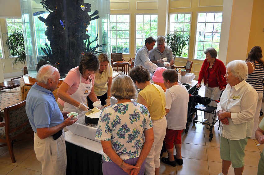Members of the Glenridge and their guests wait in line for ice cream, Sunday, Aug. 5.