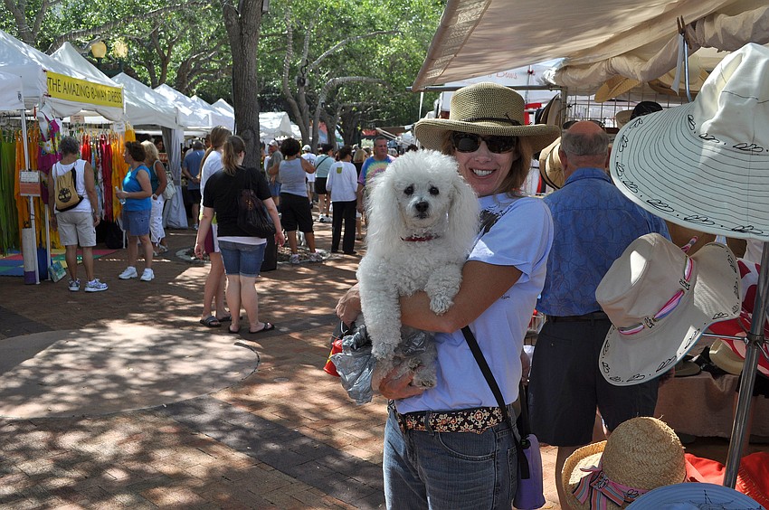 Frosty and Debra Sandefer enjoy perusing the 9th Annual Downtown Sarasota Craft Festival.