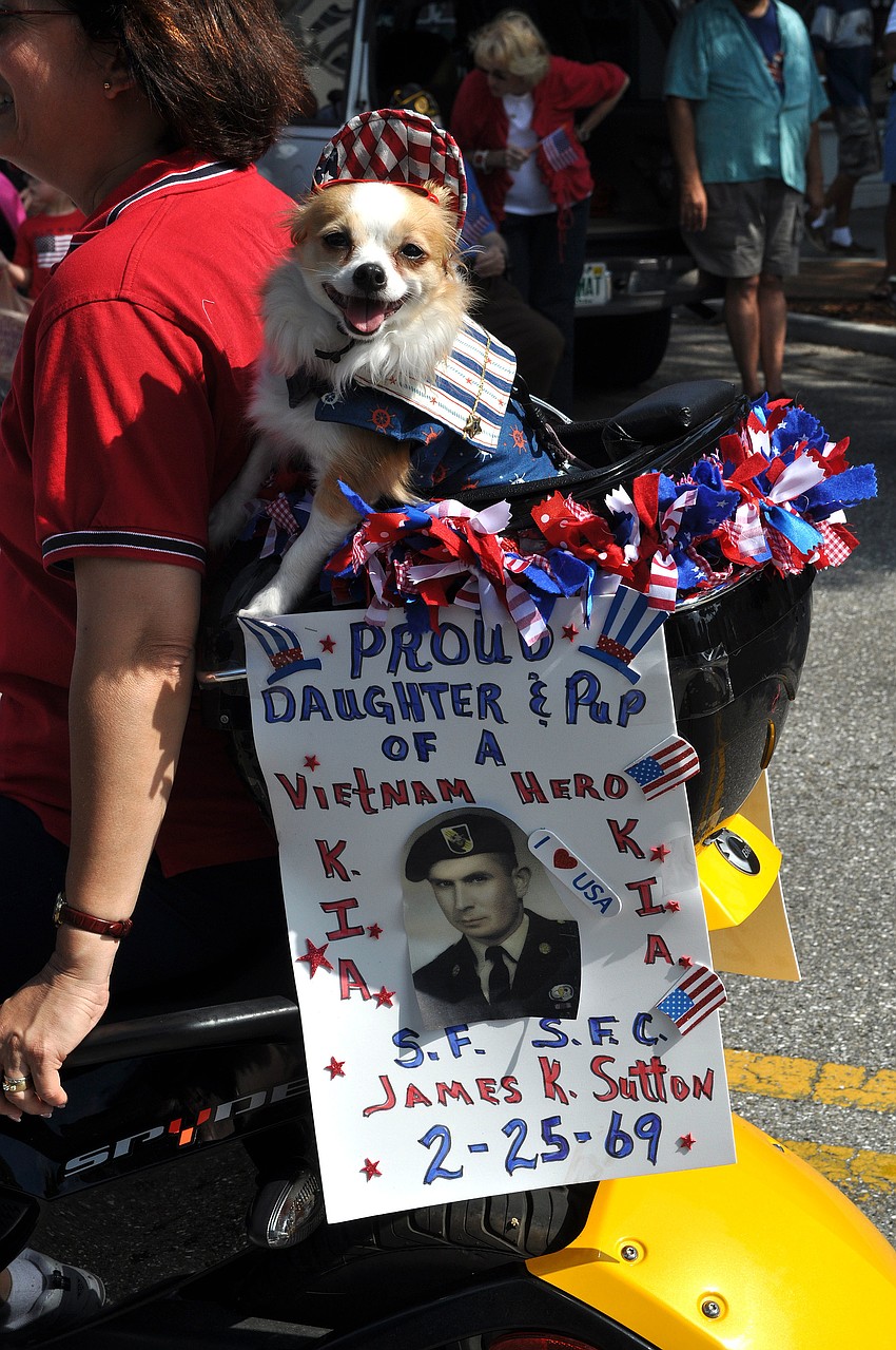 Tinkerbell was dressed up in patriotic gear and rode on the back of a motorcycle during the parade, Monday, May 28.