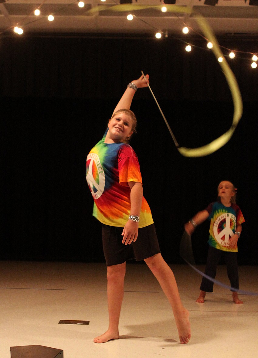 Taylor Woodring, 10, dancing to the song â€œA thousand yearsâ€.