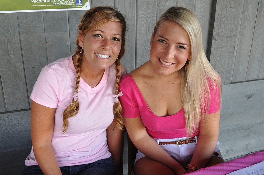 Kara Saba and Caroline Latham registered guests and sold raffle tickets.