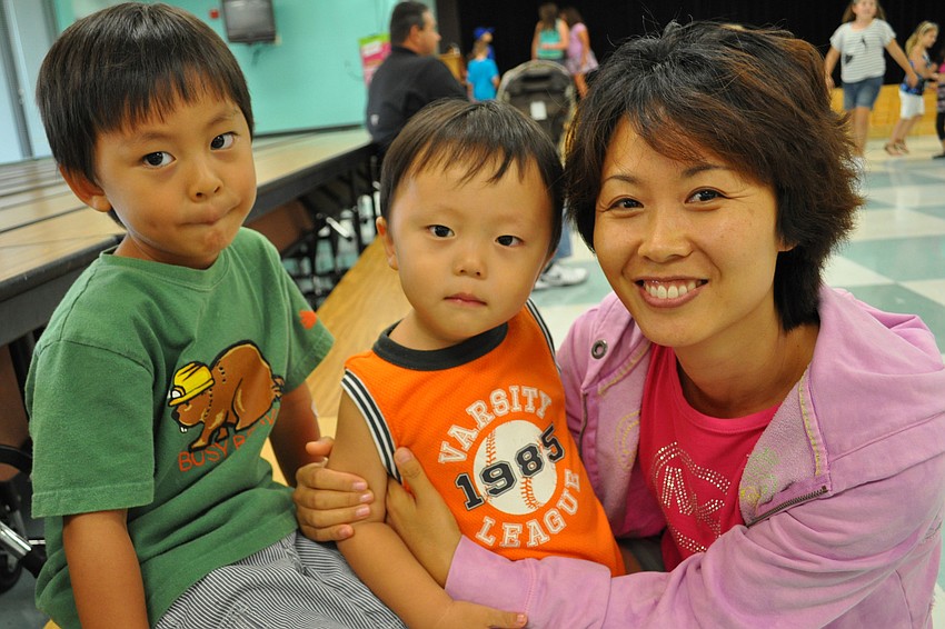 Myoung Yoon, right, loved being with her children, Samuel and Daniel Oh.
