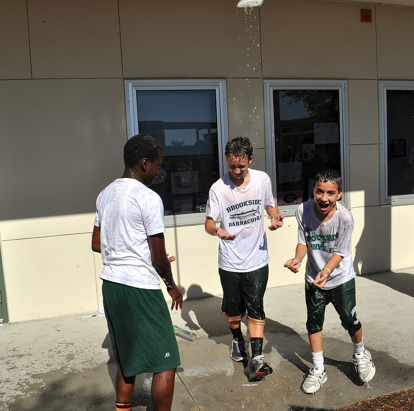 Students were challenged to bathe with only five gallons of water, using their homemade showerheads.