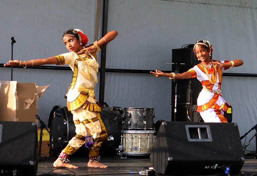 Meera Nair, 9, and Kiran Kadiyala, 9, performed a traditional Indian dance, Saturday, April 28. The girls are students at the SaiNritya Dance Group.