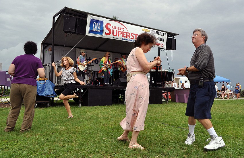People got up to dance to the music played by Yesterdayze, Friday, June 8, at Friday Fest.