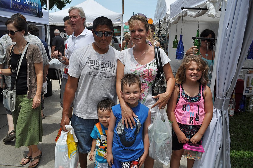Ricardo and Jenny Roman with their children Jayden, Gabriel and Taylor.