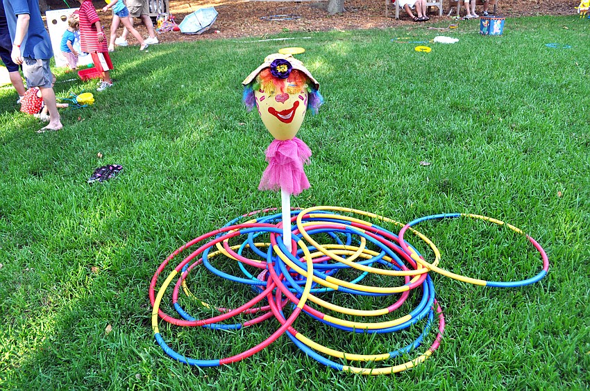 James Bartels blows bubbles with his daughter, Alethea