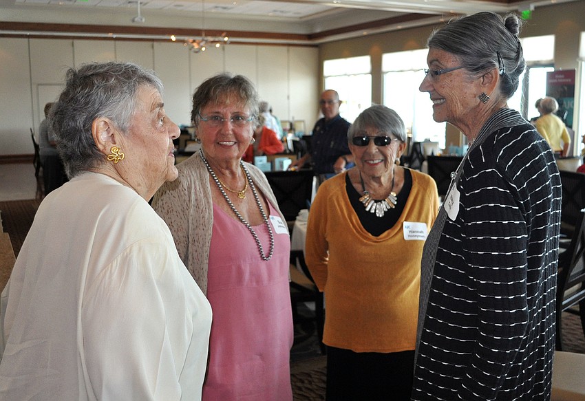 Sara Sellinger, Sue Johnson, Hannah Honeyman and Nancy Taylor chat amongst themselves, Wednesday, July 25, at AJCâ€™s 2012 Summer Lunch & Learn event at the Sarasota Yacht Club.