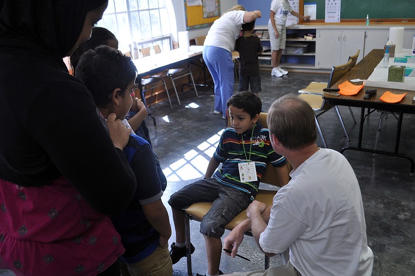 P.J. Strom sits with Madryan
