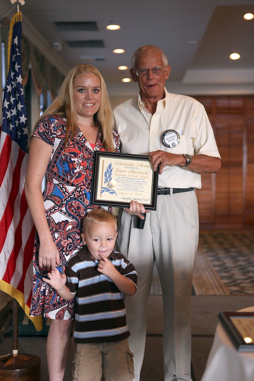 Jasper W. Masciocchi and her son, Mason, 3, pose with Weldon Frost, Thursday, August 16, at the Kiwanis Scholarship breakfast at the Longboat Boat Key Club. This is Masciocchiâ€™s second time winning a scholarship from the Longboat Key Kiwanis Club.