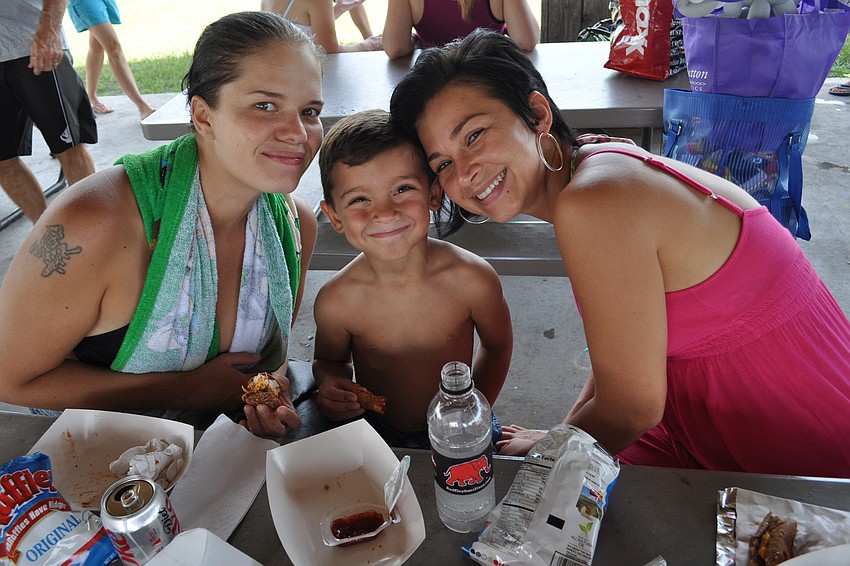 Kristy, Nicholas and Irene Silva enjoy lunch.