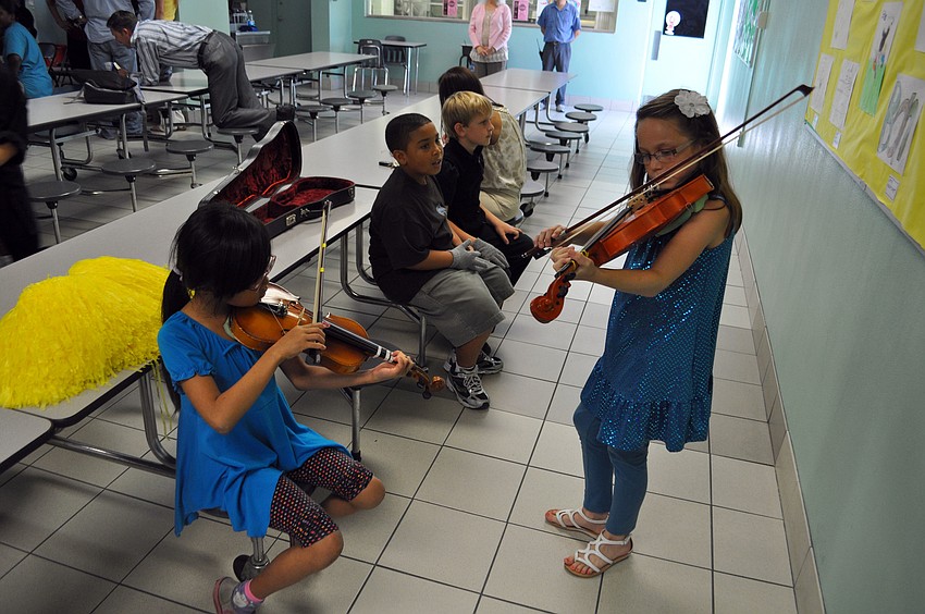 Students warm up before their performance.
