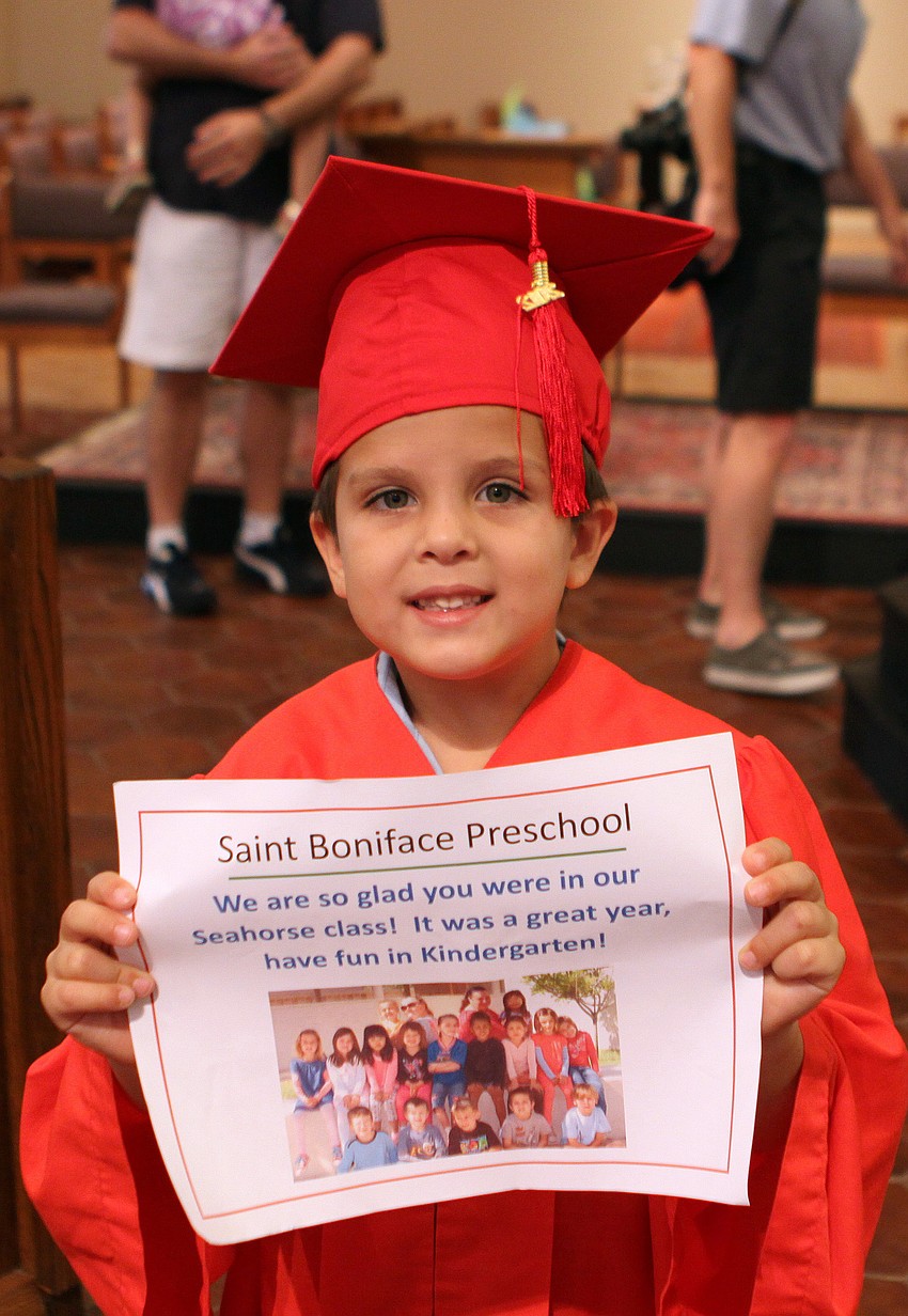 Liam Lizotte, 5, with his diploma.