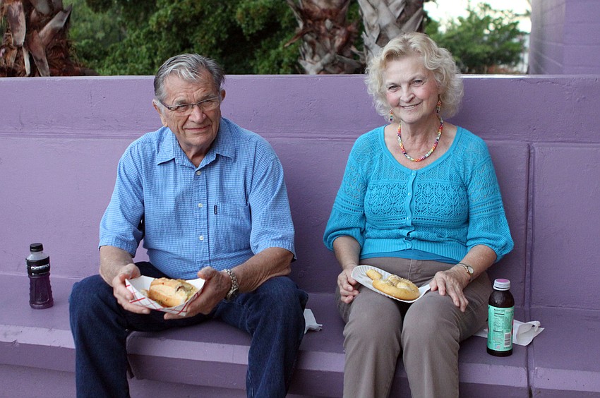 Emil and June Shidel eat outside during an intermission, Friday, July 13, at Friday Fest.