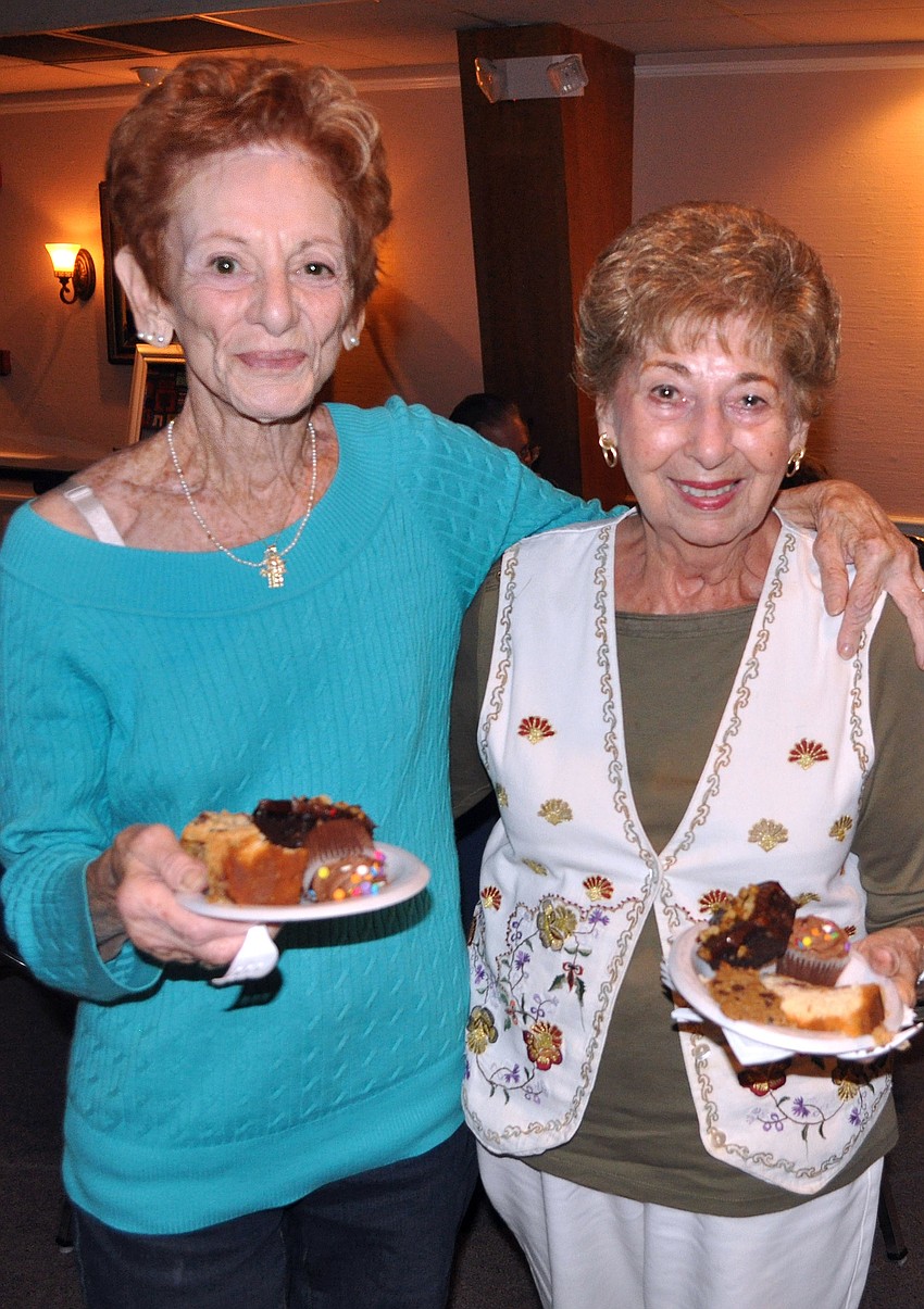 Helene Dollinger and Marge Kornswiet enjoy some of the homemade desserts following the Havdalah service.