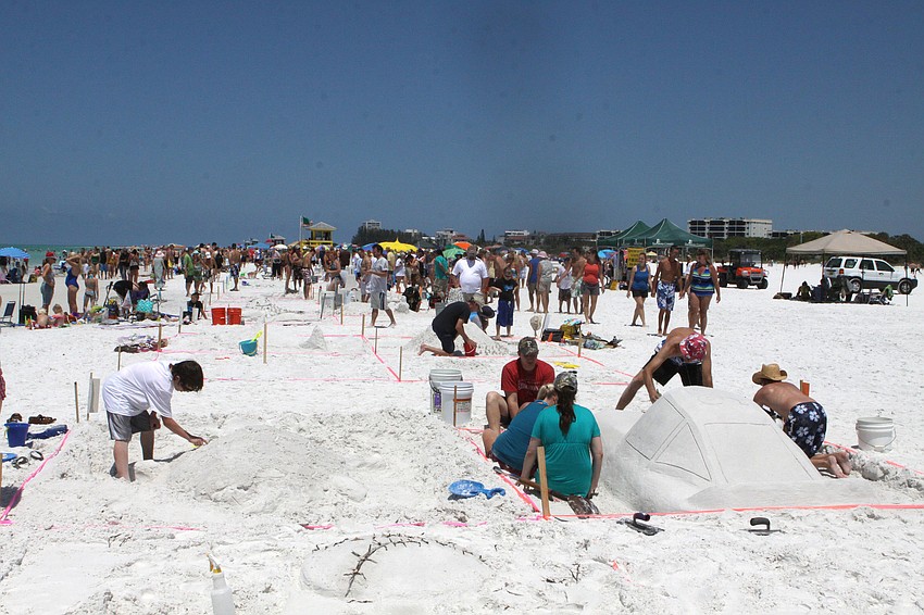 Hundreds of people participated and viewed the sand sculpture creations made, Saturday, May 5, during the 40th Annual Sand Sculpting Contest on Siesta Key Public Beach.