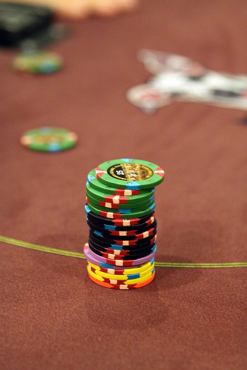 A stack of colorful poker chips.