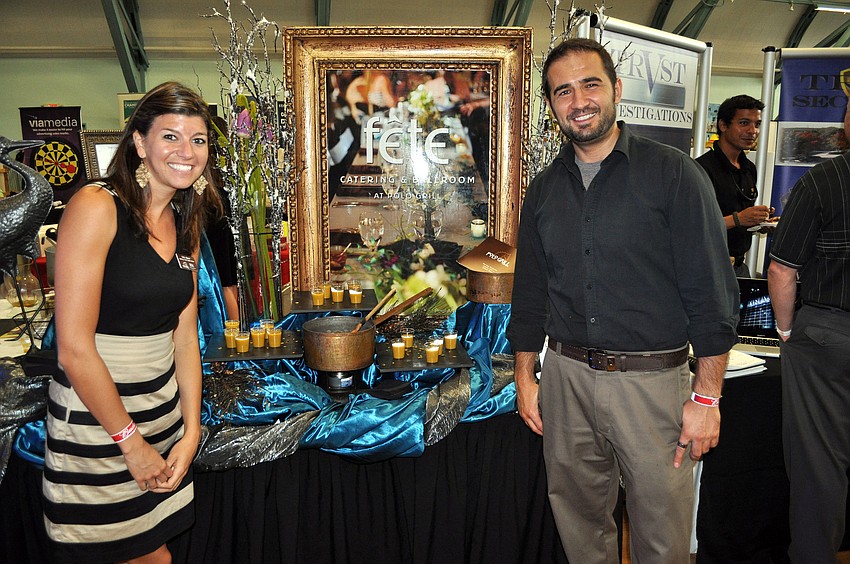 Kelly Mason and Peter Miletic, of Fete Catering, served up butternut squash bisque at their table Wednesday, Sept. 5 during the fourth annual East meets West Expo at Sarasota Municipal Auditorium.