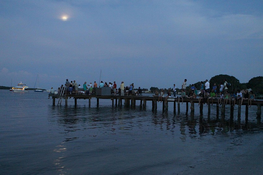 People made their way to the town dock to watch the firework display, Monday, July 2, on Longboat Key.