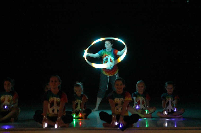 The campers used LED finger lights and hula hoops during the song â€œLightsâ€.