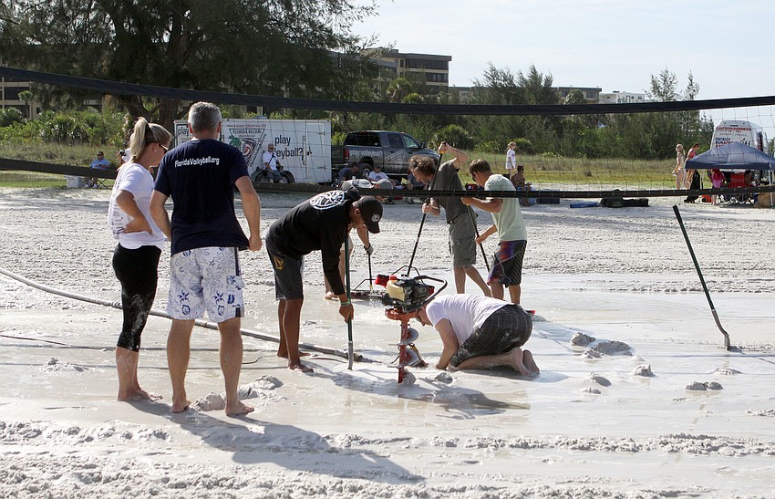 Due to the massive amount of rain on Friday night, the organizers of the event had to pump water out and off the volleyball courts before the tournament could begin.