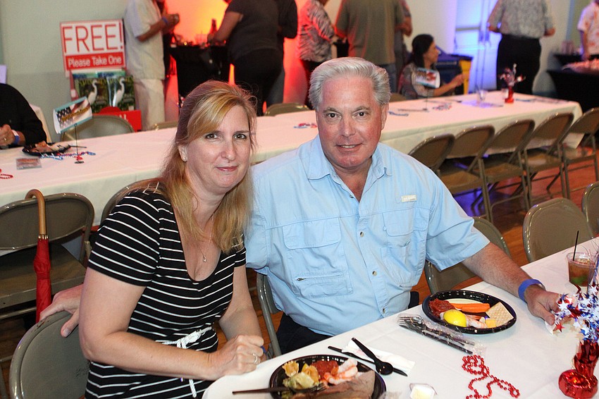 Ruth Ann and Mike Steele enjoy some food at the kickoff party, Saturday, June 23, at the Sarasota Municipal Auditorium.