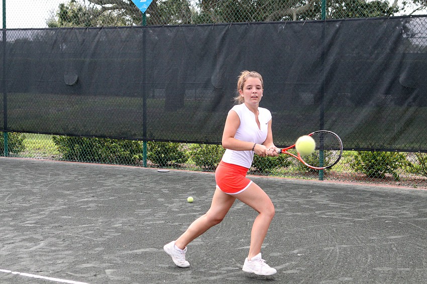 Constance Miller, 16, prepares to hit an on coming ball.