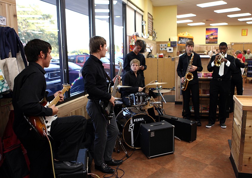 Members of the Sarasota High School Jazz Combo played during the first hour of opening day at Trader Joeâ€™s.