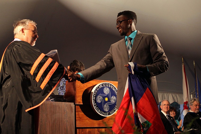 Sivens Joanes Glaude receives his diploma.