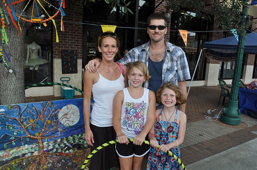 Kelly Williams stands with Mackenzie, Rylee and Joe Carter.