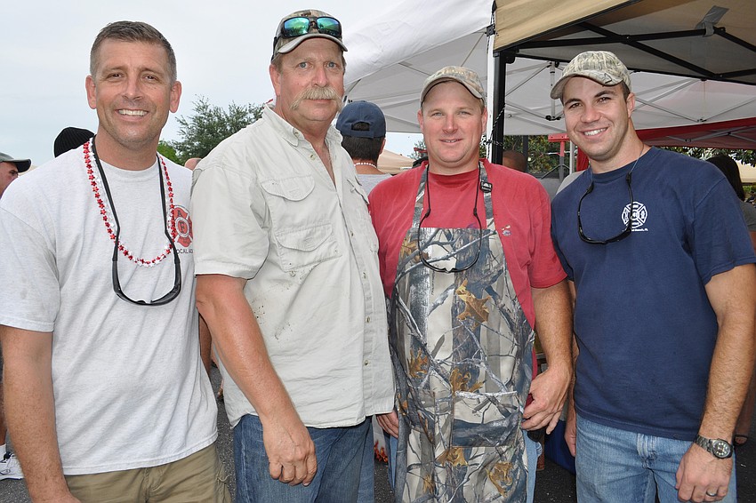Scott Rhodes, Wayne Wingard, Craig Wolfe and Eric Hoying, among others, represented the Manatee County Professional Firefighters Local 4074 barbecue team, which won the competition.