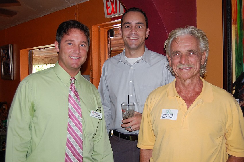 Michael McDevitt, Comcast; Kevin Cooper, president of Siesta Key Chamber of Commerce; Earl Rissler, Family Pools