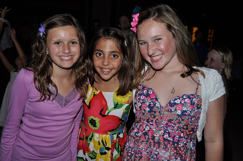 Kira Burch, Gina Masterson and Schae Mays are all smiles.