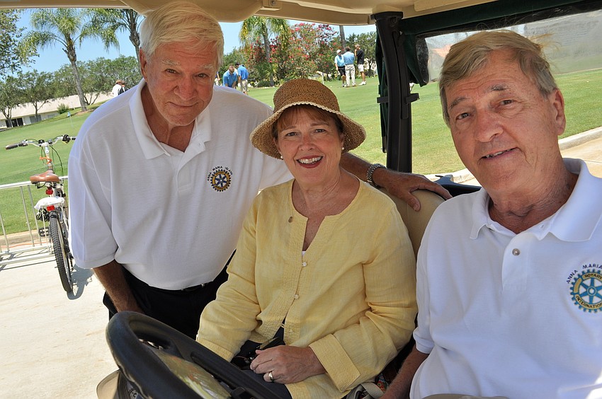 Anna Maria Island Rotary Club members Dave Wilkes, Judy Rup and Tom Creed judged the ball drop contest.