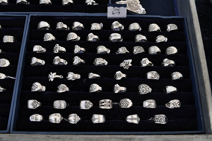 Rings made out of antique spoons were on display at the Antique Spoon Jewelry tent, Saturday, May 19.