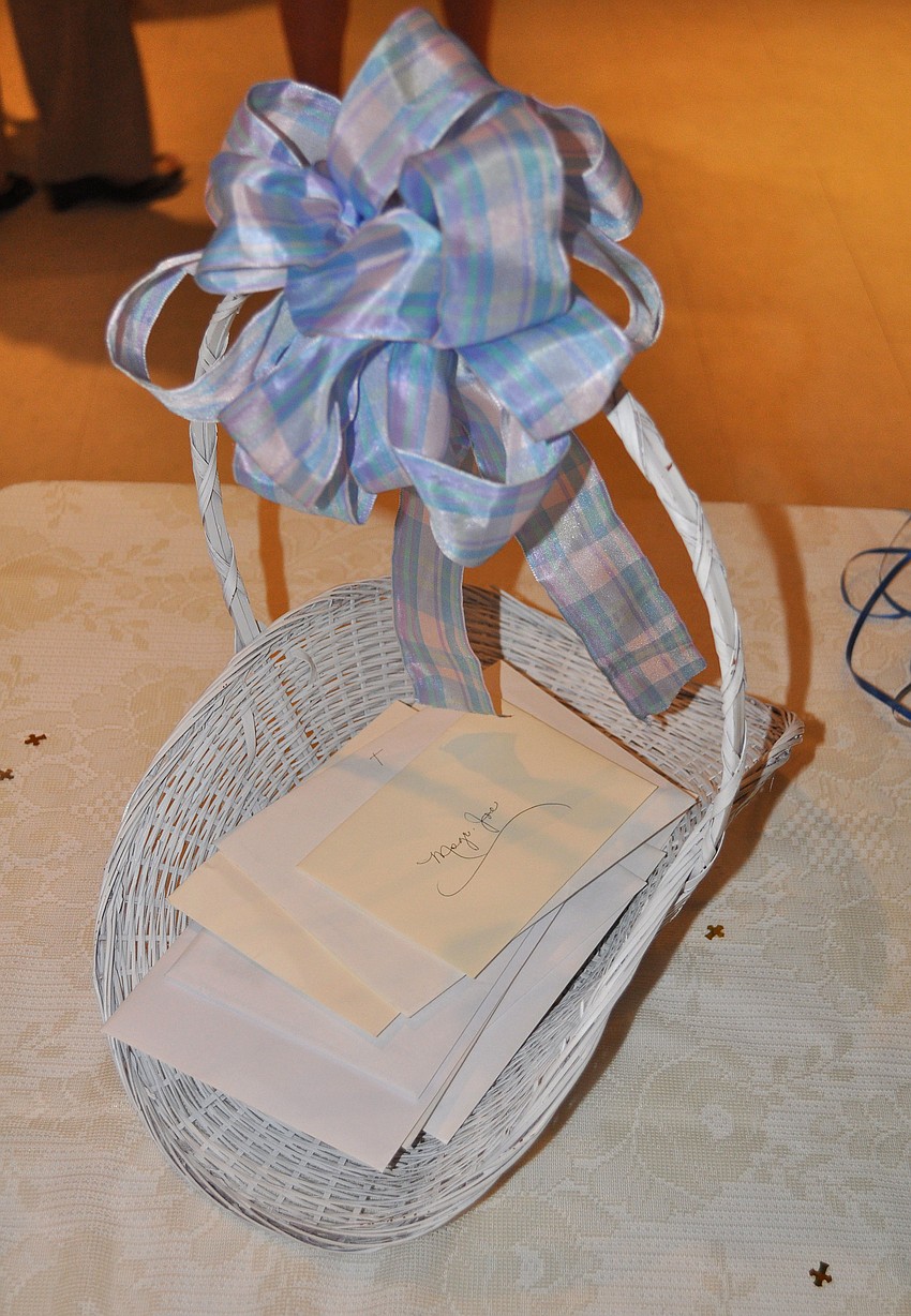 People brought cards to congratulate Msgr. Joseph Stearns for being a priest for 40 years.