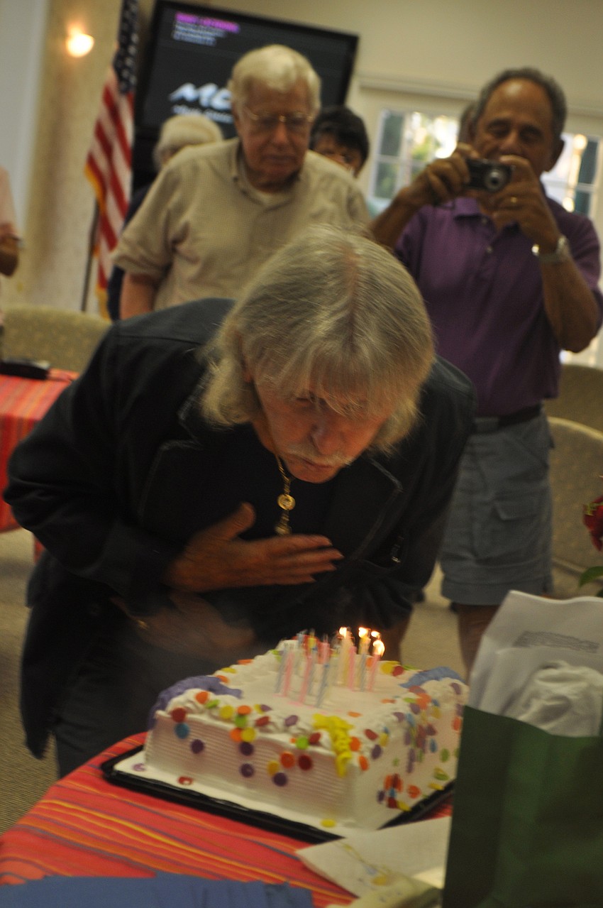 Bert Spiegel blows out his candles