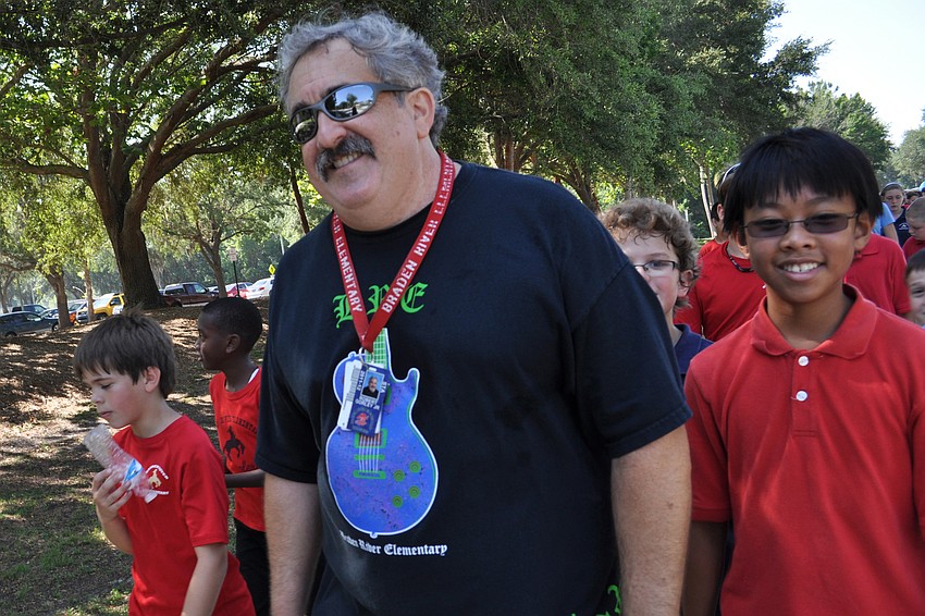 Teacher Rob Gorley led students in the last several hundred yards of the walk.