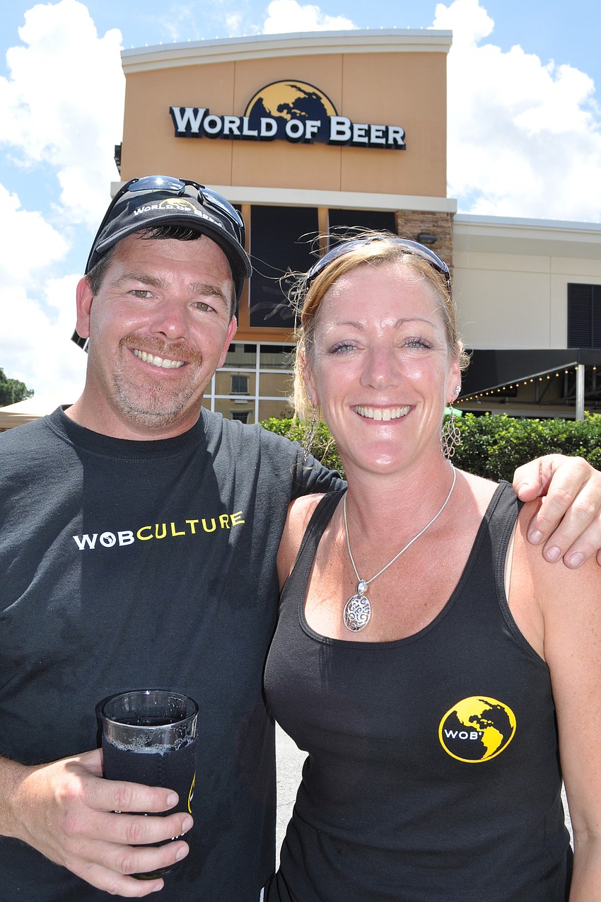 Dean and Jen Lambert took over ownership of World of Beer, along with business partner Mark Broderick, not pictured, in February.